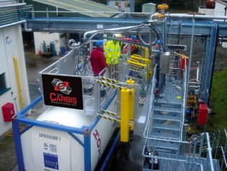 Isotainer loading with wide gangway and loading arm. Aluminum handrails