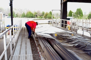 OSHA compliant Fall Protection System helps speed up flatbed tarping.